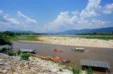 The Golden Triangle designates the confluence of the Ruak River and the Mekong River; the junction of Thailand, Laos and Myanmar.<br/><br/>

The Mekong is the world's 10th-longest river and the 7th-longest in Asia. Its estimated length is 4,909 km (3,050 mi)  and it drains an area of 795,000 km2 (307,000 sq mi), discharging 475 km3 (114 cu mi) of water annually.<br/><br/>

From the Tibetan Plateau the Mekong runs through China's Yunnan province, Burma, Laos, Thailand, Cambodia and Vietnam.