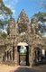 The Victory Gate of Angkor Thom. Angkor Thom (Great City) was established in the 12th century by King Jayavarman VII.<br/><br/>

Angkor Thom is located one mile north of Angkor Wat. It was built in the late 12th century by king Jayavarman VII, and covers an area of 9 km², within which are located several monuments from earlier eras as well as those established by Jayavarman and his successors. At the centre of the city is Jayavarman's state temple, the Bayon, with the other major sites clustered around the Victory Square immediately to the north.<br/><br/>

Angkor Thom was established as the capital of Jayavarman VII's empire, and was the centre of his massive building programme. One inscription found in the city refers to Jayavarman as the groom and the city as his bride. Angkor Thom seems not to be the first Khmer capital on the site, however, as Yasodharapura, dating from three centuries earlier, was centred slightly further northwest. The last temple known to have been constructed in Angkor Thom was Mangalartha, which was dedicated in 1295. In the following centuries Angkor Thom remained the capital of a kingdom in decline until it was abandoned some time prior to 1609. It is believed to have sustained a population of 80,000-150,000 people.